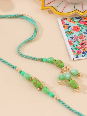 set of 2 green artificial beads bhaiya bhabhi rakhi with roli chawal chandan & mishri 1