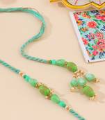 set of 2 green artificial beads bhaiya bhabhi rakhi with roli chawal chandan & mishri