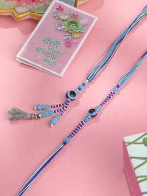 set of 2 blue evil eye artificial beads bhaiya bhabhi rakhi with roli chawal chandan & mishri 1