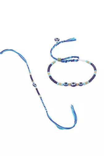 set of 2 blue evil eye artificial beads bhaiya bhabhi rakhi with roli chawal chandan & mishri