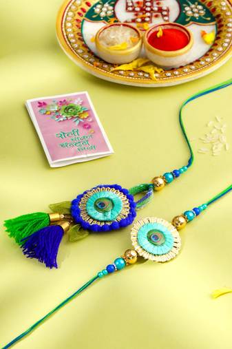 set of 2 multicolor artificial beads bhaiya bhabhi rakhi with roli chawal chandan & mishri