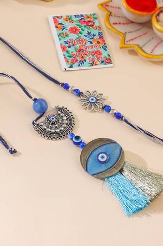 set of 2 blue evil eye artificial beads bhaiya bhabhi rakhi with roli chawal chandan & mishri