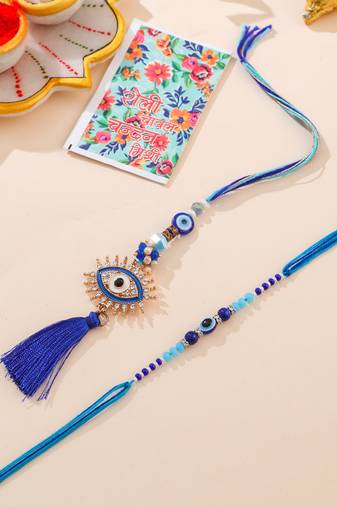 set of 2 blue evil eye artificial stones & beads bhaiya bhabhi rakhi with roli chawal chandan & mishri