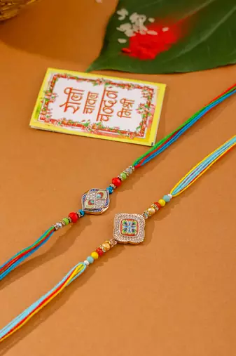 men set of 2 multicolor artificial stones thread rakhi with roli chawal chandan & mishri