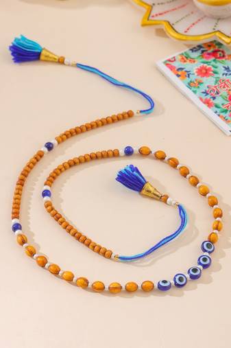 men evil eye multicolor thread rakhi with roli chawal chandan & mishri