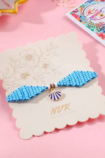 men blue pearls unique design thread rakhi with roli chawal chandan & mishri