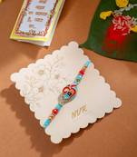 men red & blue artificial stones and beads om thread rakhi with roli chawal chandan & mishri