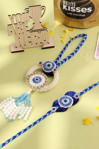 set of 2 blue evil eye artificial stones & pearls bhaiya bhabhi rakhi combo