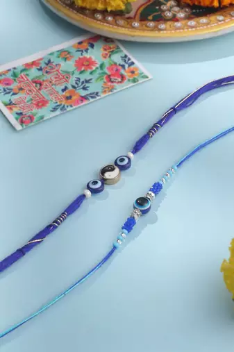 men set of 2 blue evil eye artificial beads thread rakhi with roli chawal chandan & mishri