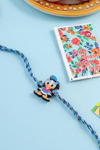 stylish blue cartoon character kids rakhi with roli chawal chandan & mishri