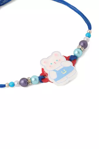 kids teddy blue artificial beads thread rakhi with roli chawal chandan & mishri