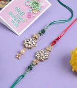 set of 2 gold toned kundan studded floral design bhaiya bhabhi rakhi with roli chawal chandan & mishri