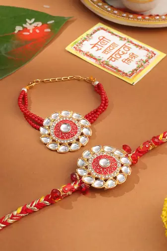 set of 2 handmade red kundan studded floral design bhaiya bhabhi rakhi with roli chawal chandan & mishri