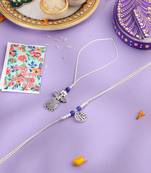 set of 2 silver toned pearls & beads bhaiya bhabhi rakhi with roli chawal chandan & mishri