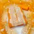 orange organza embroidered unstitched dress material