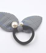 Viaana checks print ears rubber band with attached pearls black color