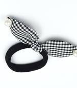 Viaana checks print ears rubber band with attached pearls black color