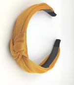 Viaana self textured fabric knot hair band yellow color