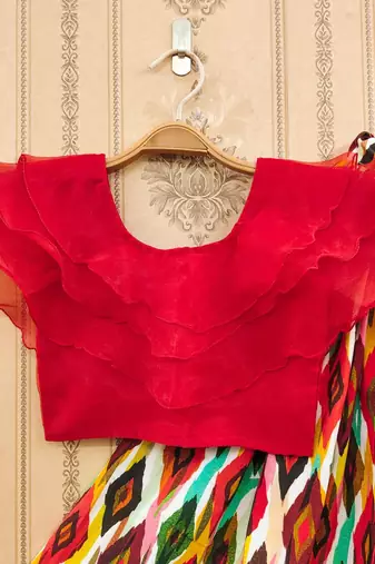 Vibrant ikat print lehenga set with ruffle blouse