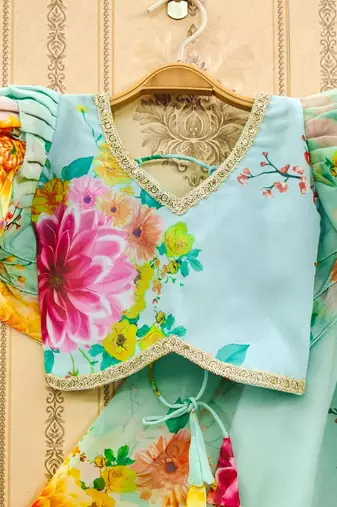 Floral printed lehenga with ruffle blouse