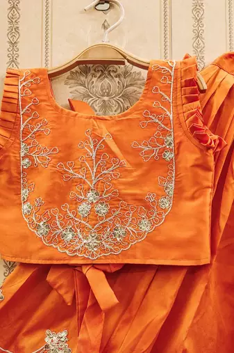 Elegant orange embroidered kids' lehenga set