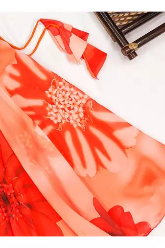 Orange floral printed lehenga with ruffle blouse