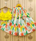 Vibrant floral lehenga with yellow ruffle top