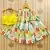 Vibrant floral lehenga with yellow ruffle top