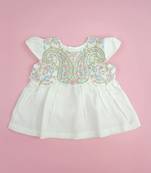 White paisley cotton embroidered girls dress with cap sleeves