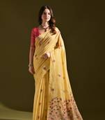Yellow woven muga cotton saree with blouse piece
