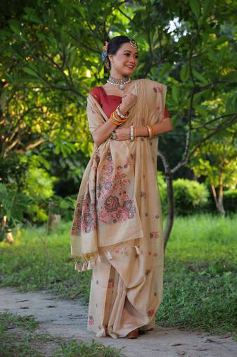 Beige woven muga cotton saree with blouse piece