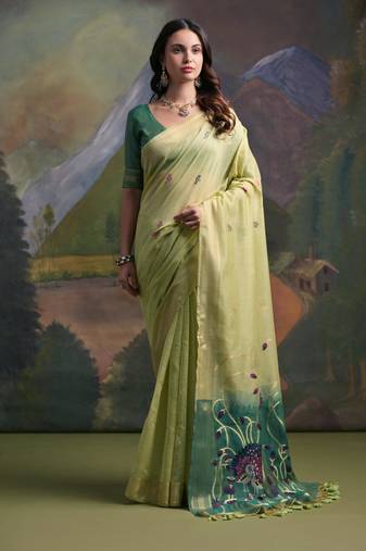 Green woven muga cotton saree with blouse piece