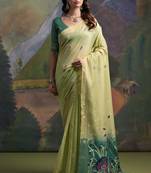 Green woven muga cotton saree with blouse piece