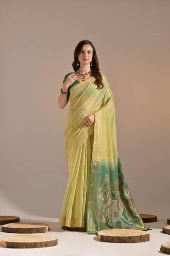 Green woven muga cotton saree with blouse piece