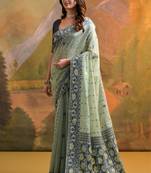 Sea green woven muga cotton saree with blouse piece