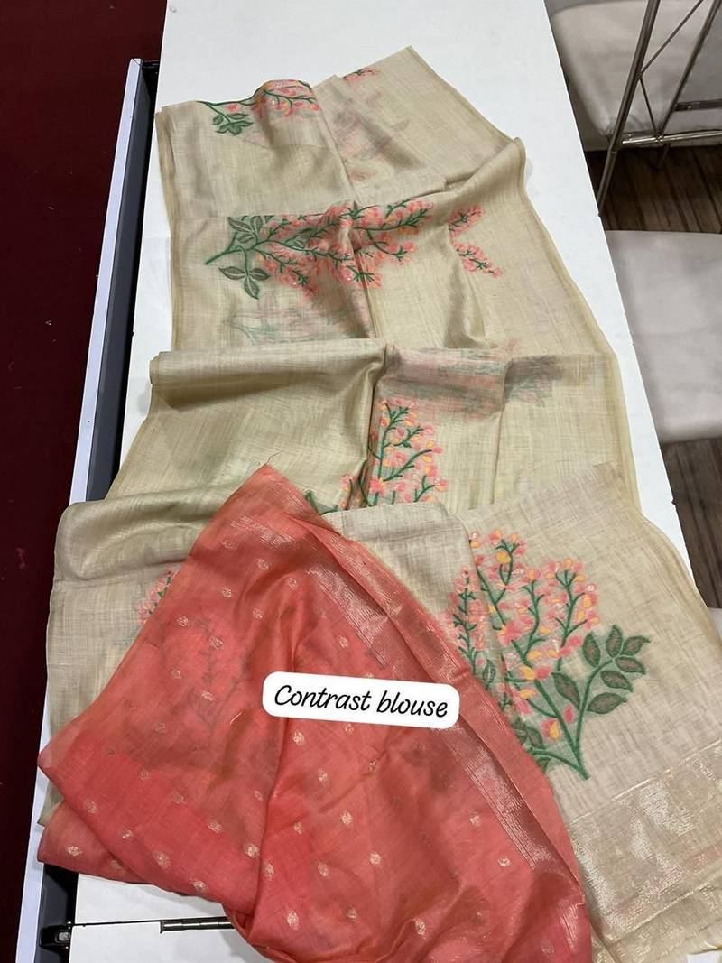 Cream woven muga cotton saree with blouse piece