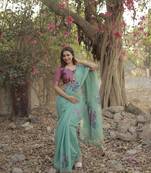 Turquoise woven muga cotton saree with blouse piece