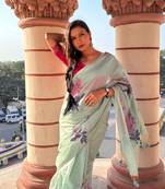 Turquoise woven muga cotton saree with blouse piece