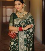 Green woven silk blend kanjivaram saree with blouse