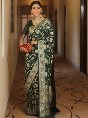 Green woven silk blend kanjivaram saree with blouse 2