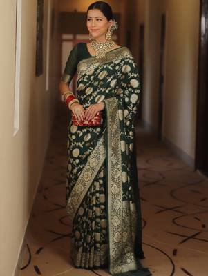 Green woven silk blend kanjivaram saree with blouse 3