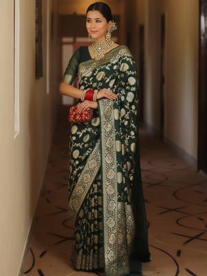 Green woven silk blend kanjivaram saree with blouse 4