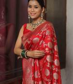 Red woven silk blend kanjivaram saree with blouse