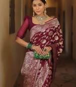 Magenta woven silk blend kanjivaram saree with blouse