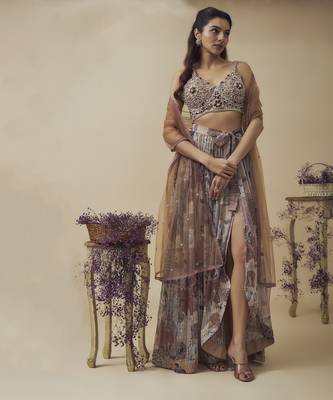 Printed lurex chiffon hand embroidered bustier along with asymetric gathered skirt and embroidered net dupatta 1