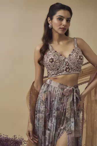 Printed lurex chiffon hand embroidered bustier along with asymetric gathered skirt and embroidered net dupatta