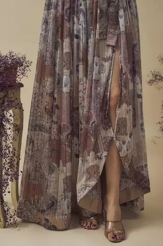 Printed lurex chiffon hand embroidered bustier along with asymetric gathered skirt and embroidered net dupatta