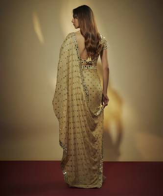 Gold pre drapped chinnon chiffon sequins saree with mirror and sequins hand embroidery. 4