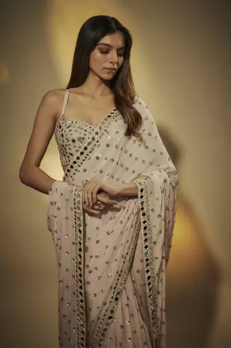 Pre drappe chinnon chiffon sequins and mirror work hand embroidered saree
