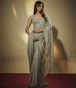 Steel grey sequins and mirror embroidered draped skirt set.